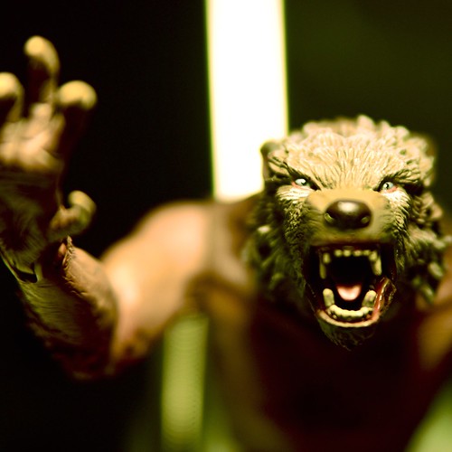 a macro photo of a werewolf toy